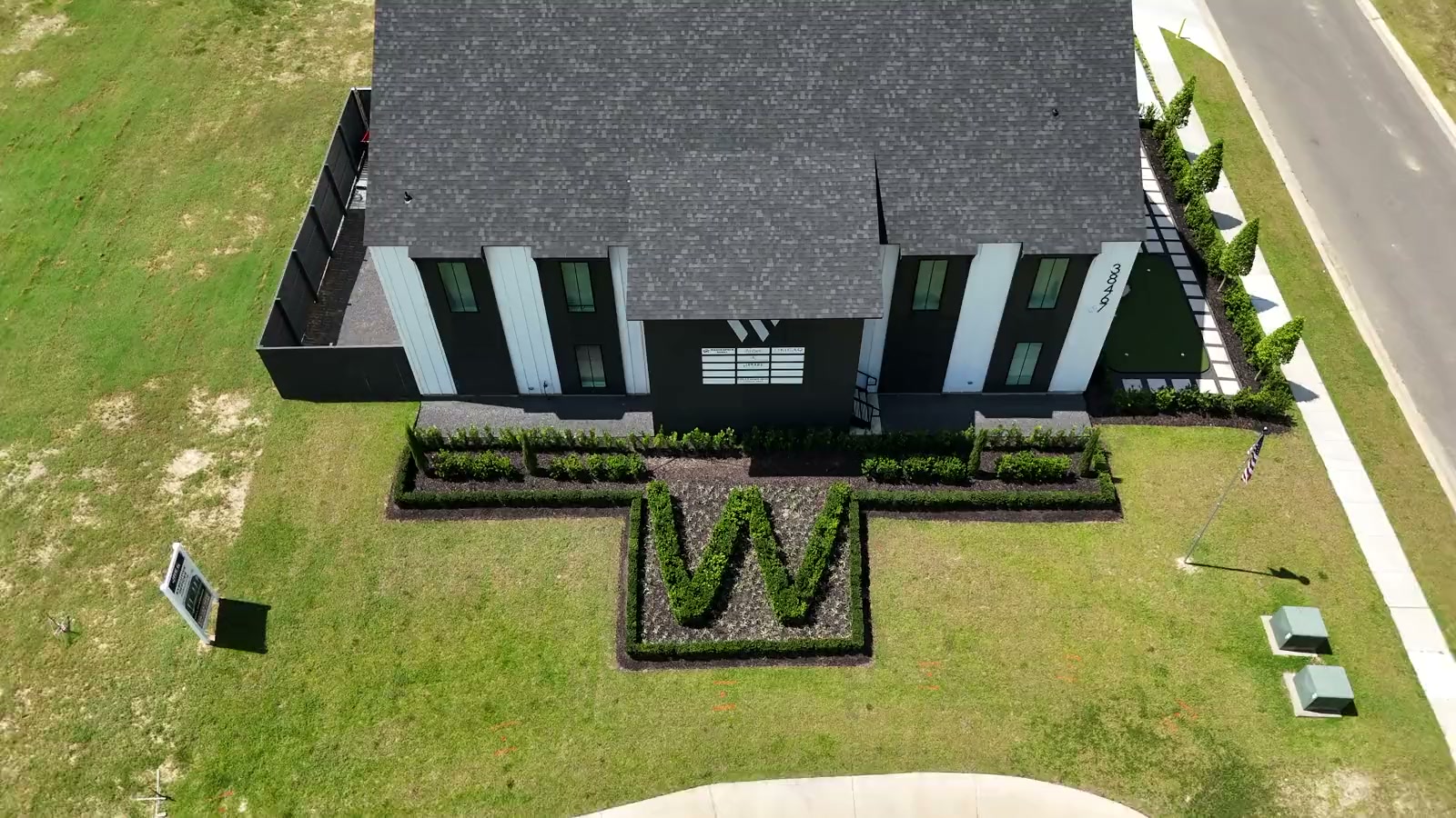 The W Office Suites: executive office space in Prairieville, LA Aerial view of The W Office Suites in Prairieville, Louisiana, with the signature W hedge garden out front